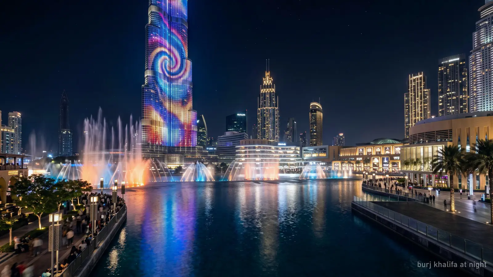 The Burj Khalifa facade lit with colourful LED light patterns at night above Burj Lake (generated illustration)